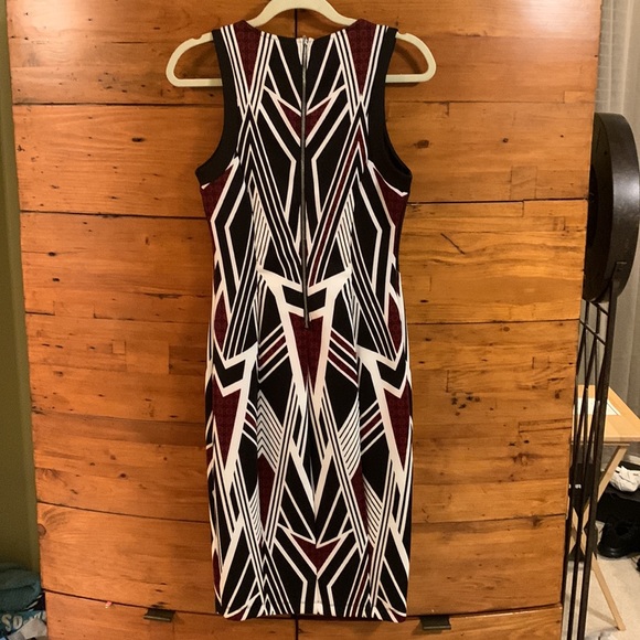 Super nice form fitting dress. Zip back. Polyester/Spandex blend. - Picture 3 of 3